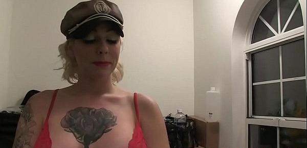  Inked milf showing her big tits in BTS video